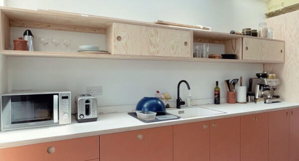 bespoke overhead kitchen cupboard with sliding doors